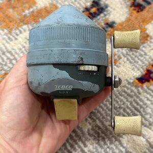 Zebco 808 vintage closed face classic fishing reel push button style collectible